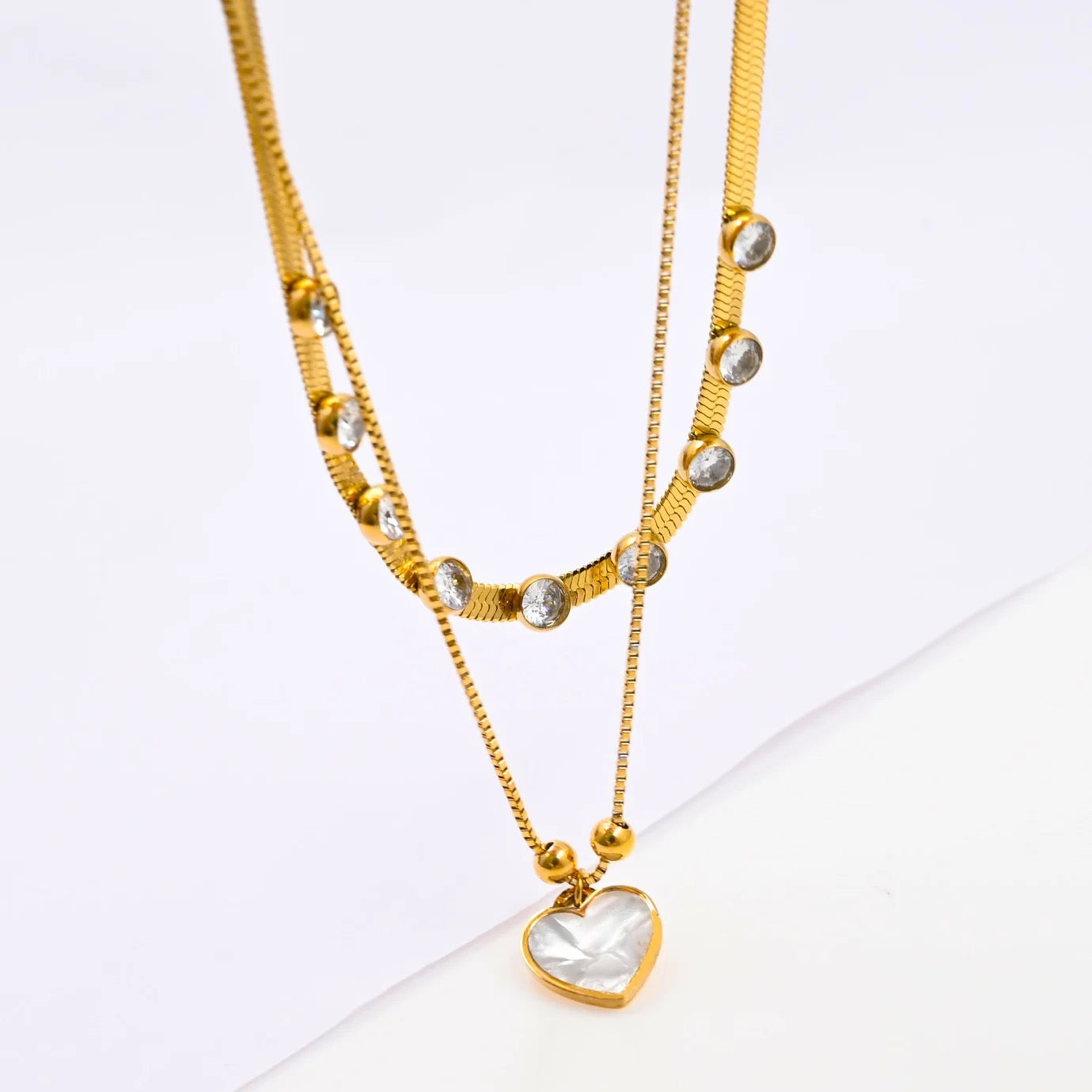 two lawyer Pearl heart necklace